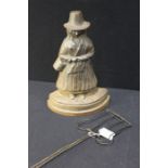 Iron door stop, in the form of a lady with a long coat and hat, together with a Victorian toasting