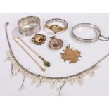 Jewellery, to include a necklace, a silver bracelet, pendants, a silver medal, a silver napkin ring