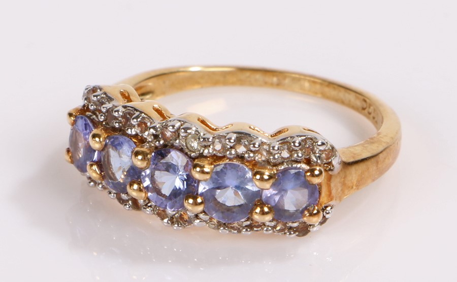Tanzanite and white topaz ring, silver with gold plated shank, ring size O