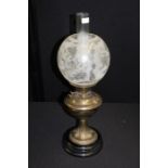 British Made oil lamp, with frosted and clear glass shade, brass reservoir and acanthus leaf stem,