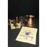 Works of art, to include a door stop, a sampler, a quart copper jug, a candle stick, a pair of