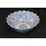 Blue and white bowl, the fluted body with foliate and scroll transferred decoration, 24.5cm