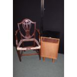 Stag "C" range bedside table, with ebonised top above an open recess and cupboard doors, elbow chair