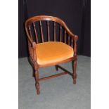 19th Century beech armchair, with a curved spindle back