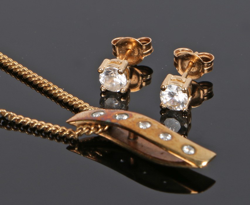 9 carat gold jewellery set, to include a pendant necklace set with cubic zirconia and a pair of