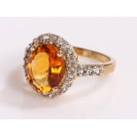 Madeira Citrine and white topaz ring, set to a silver gold plated shank, ring size J