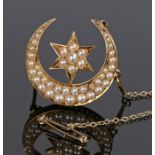 Edwardian pearl set crescent and star brooch, set with pearls all over to the yellow metal brooch,