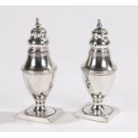 Pair of George V silver pepperettes, Birmingham, 1912, maker Asprey & Co Ltd, the detachable pierced