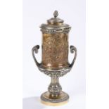 19th Century gilt white metal cup and cover, the lid with pineapple finial and acanthus leaf