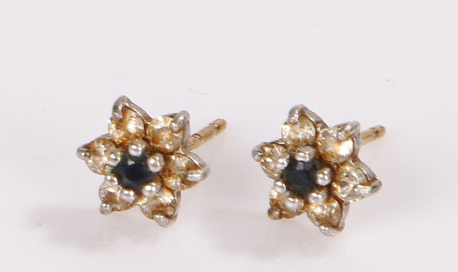 Pair 9 carat gold flower head design earrings