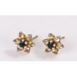 Pair 9 carat gold flower head design earrings