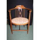 Edwardian mahogany armchair, with arched back and pad seat