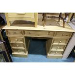 Pine twin pedestal desk, with three frieze drawers above three drawers to each pedestal, 122cm wide