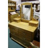 Edwardian pine dressing table, with bevelled mirror flanked byn two small drawers, the base with two