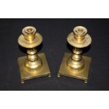 Pair of brass candlesticks, with square bases, (2)