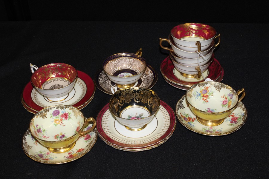 Paragon Fine Bone Cabinet cups and a saucers, various design with floral sprays