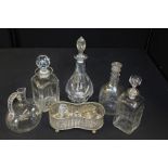 Decanters, together with a silver plated stand