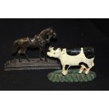 Two door stops, in the form of a horse and a cow, (2)