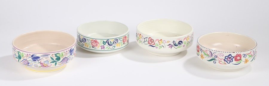 Four Poole pottery fruit bowls, with bird and foliate decoration (4)