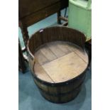 Barrell chair, with a gallery back and hinged seat