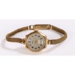 Avia 9ct gold ladies wristwatch., the signed silver dial wit Arabic numerals and subsidiary