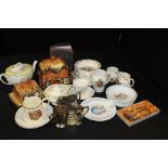 Decorative china, to include Royal Doulton Bunnykins cups & plates, cottage form biscuit barrel &
