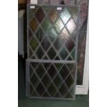 Eight stained glass panels, with green and purple diamond pattern, the largest 78cm x 40cm (8)