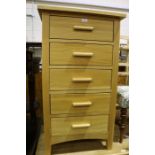 Light oak chest of five drawers, on square tapering legs, 55cm wide