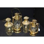Two miners style lamps, together with a pair of lamps, (4)