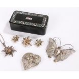 Silver and white metal jewellery, to include a butterfly brooch, another brooch and foliate set