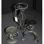 Three contemporary decorative cast iron candlesticks, (3)