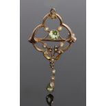 9 carat gold peridot and pearl pendant, in the Art Nouveau taste, with a central peridot and pearl