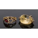 19th Century garnet set ring, with one garnet, the other missing, together with a swivel seal, (2)