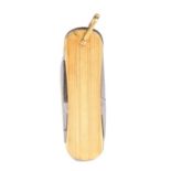14 carat gold mounted penknife, the ribbed body containing knife, nail file and folding scissors,