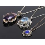 Silver pendant necklaces, the purple navette stone with claw mount, together with a flower design