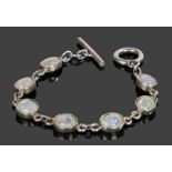 Silver bracelet, set with translucent stones to the chain links, 19cm long