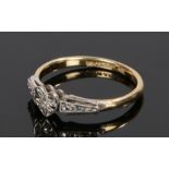 18 carat gold diamond set ring, with a heart and central diamond, 2.4 grams, ring size M 1/2