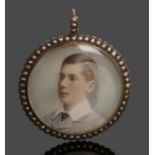 Edwardian portrait miniature pendant, with a portrait of a young man housed within the pearl set
