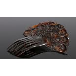 Early 20th Century tortoiseshell hair slide, with foliate scroll design and six comb prongs, 17.