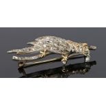 Diamond set parrot brooch, with rows of rose cut diamonds set to the parrot form, 53mm long