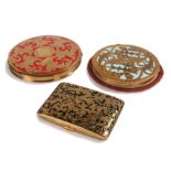 Three vintage enamel compacts with decorative cut work, One flapjack size Rex Fifth Avenue USA in