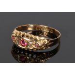 18 carat gold diamond and spinel ring, the central pink spinel flanked by diamonds and further
