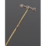 Diamond set stick pin, with three round cut diamonds to the head, the head 12mm diameter