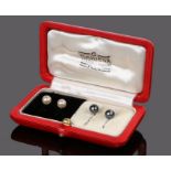 Cased set of pearls, with black and white pearls and sprung backs, cased with in Mahieux box