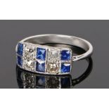 Sapphire and diamond set ring, with six sapphires and six diamonds to the white metal head and