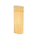 Cartier lighter, in gilt metal and ribbed body, 7cm high