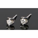 Pair of diamond set ear studs, the round cut diamonds at 0.20 carat each set to 9 carat gold white