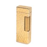Dunhill lighter, in gilt metal with a bark effect body, 6.5cm high