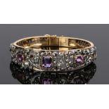 Amethyst and diamond set bracelet, with three emerald cut amethysts and a rose cut diamond surround,