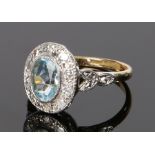 18 carat gold aquamarine and diamond set ring, the central aquamarine at an estimated 1.48 carat